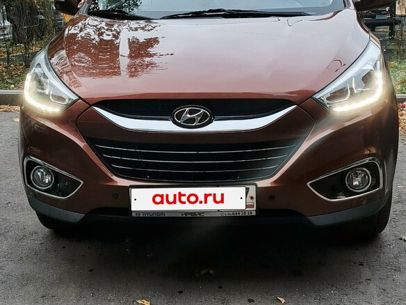 2013 Hyundai ix35 I Рестайлинг, коричневый - вид 1
