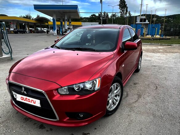 2012 Mitsubishi Lancer X Рестайлинг, красный, 1050000 рублей - вид 2