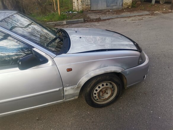 2012 Daewoo Nexia I Рестайлинг, серебристый, 140000 рублей - вид 4