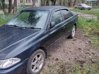 1999 Toyota Carina VII (T210), синий, 500000 рублей, вид 2