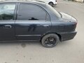 2006 Kia Spectra I Рестайлинг 2, чёрный - вид 3