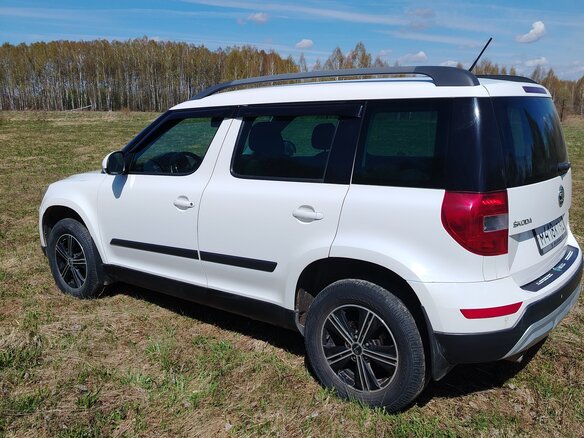 2014 Skoda Yeti I Рестайлинг, белый, 825000 рублей - вид 5