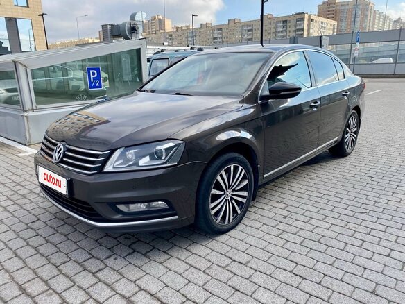 2014 Volkswagen Passat B7, коричневый - вид 1