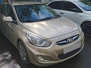 2011 Hyundai Solaris I, жёлтый, 564000 рублей, вид 1