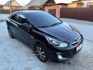 2011 Hyundai Solaris I, чёрный, 750000 рублей, вид 3