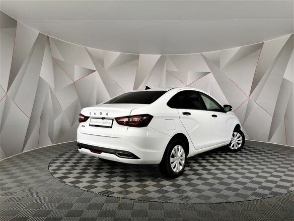 2023 Lada (ВАЗ) Vesta I Рестайлинг (NG), белый, 945150 рублей - вид 1