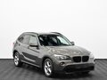2011 BMW X1 18i I (E84), коричневый