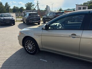 2008 Mitsubishi Lancer X, золотистый, 620000 рублей, вид 2