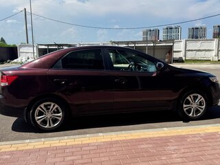 2010 Kia Cerato 6-speed II, пурпурный, 700000 рублей, вид 3