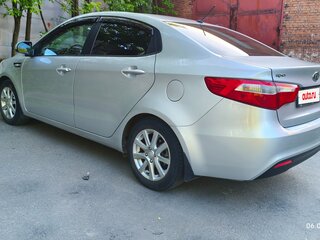 2012 Kia Rio 5-speed III, серебристый, 770000 рублей, вид 3
