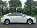2022 Toyota Corolla Sporty XII (E210) Рестайлинг, белый, 1180000 рублей - вид 7