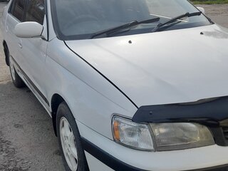 1995 Toyota Corolla VIII (E110), белый, 370000 рублей, вид 1