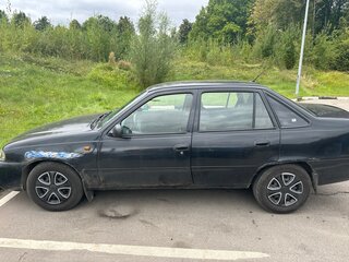 2011 Daewoo Nexia I Рестайлинг, чёрный, 140000 рублей, вид 3