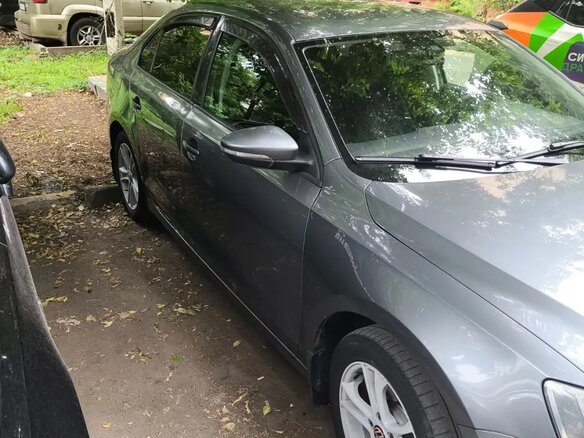 2012 Volkswagen Jetta VI, серый, 730000 рублей - вид 4