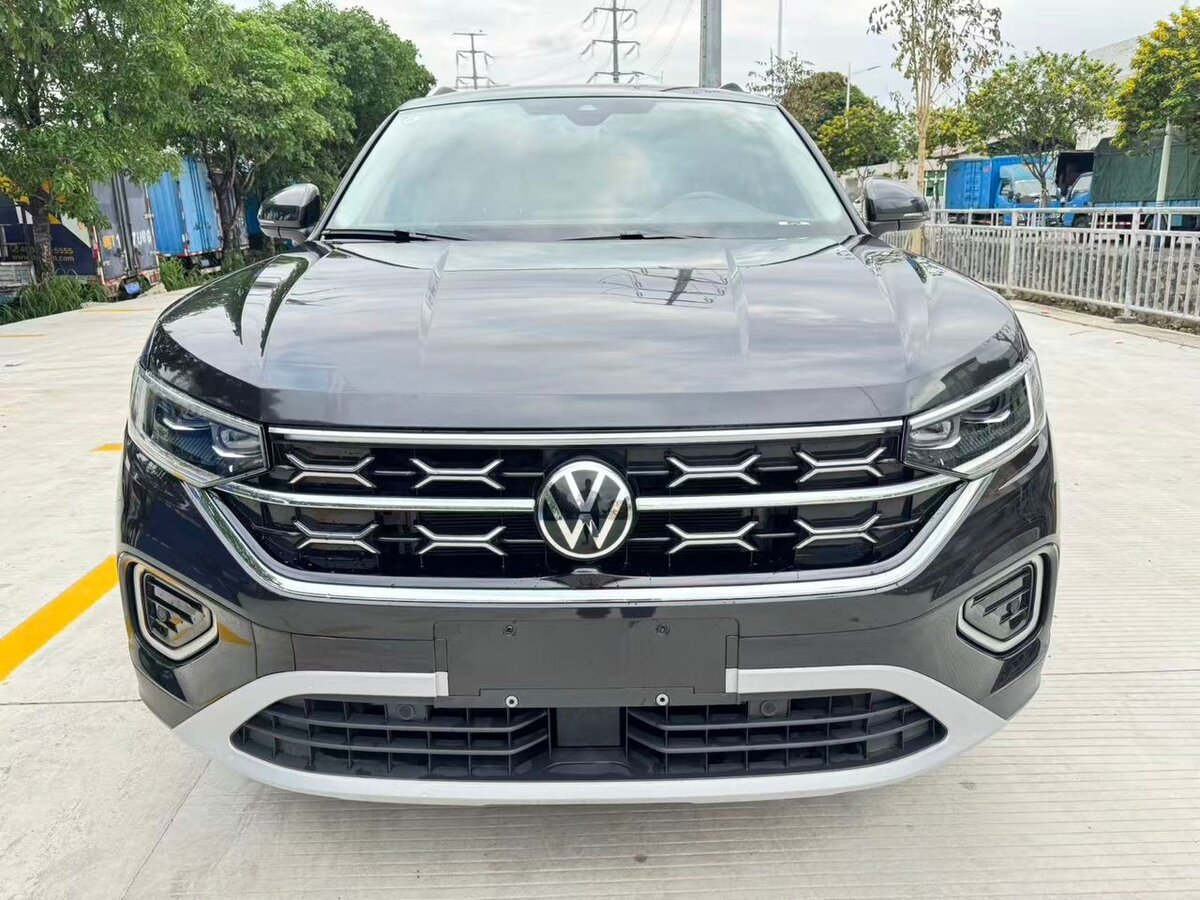 Открыть фотографии: Volkswagen Tayron I Рестайлинг