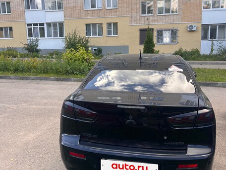 2012 Mitsubishi Lancer X Рестайлинг, чёрный, 900000 рублей, вид 3