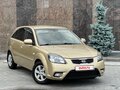 2011 Kia Rio II Рестайлинг, бежевый