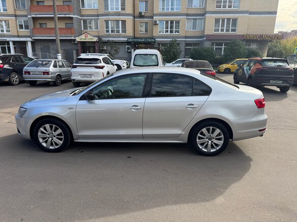2013 Volkswagen Jetta VI, серебристый - вид 5