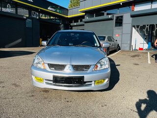 2005 Mitsubishi Lancer IX Рестайлинг, серебристый, 660000 рублей, вид 2