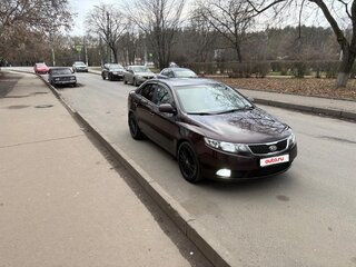 2011 Kia Cerato 6-speed II, пурпурный, 950000 рублей, вид 1
