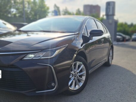 2019 Toyota Corolla XII (E210), коричневый, 1820000 рублей, вид 1