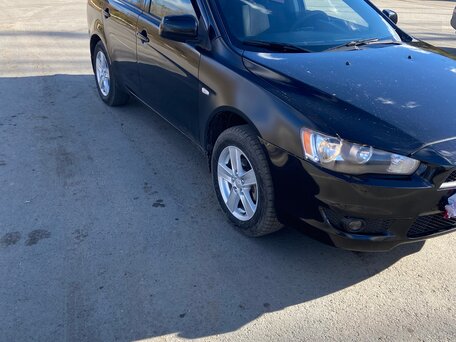 2007 Mitsubishi Lancer X, чёрный, 600000 рублей, вид 2