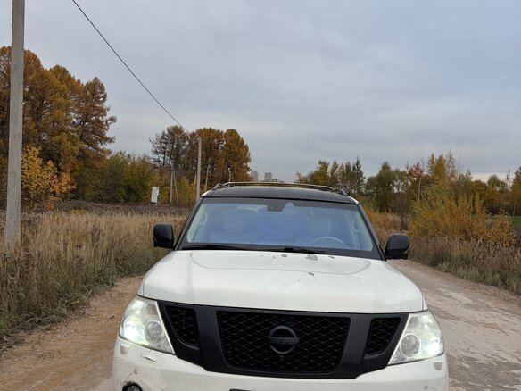 2012 Nissan Patrol VI (Y62), белый - вид 1