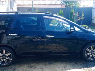 2006 Mitsubishi Grandis I, чёрный, 640000 рублей, вид 2