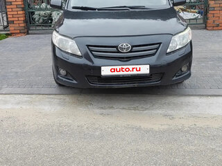 2010 Toyota Corolla X (E140, E150), чёрный, 595000 рублей, вид 2