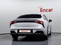 2025 Kia K5 LPi III Рестайлинг, белый - вид 3