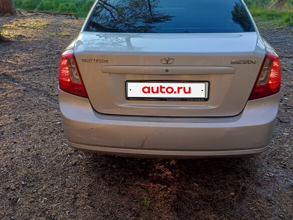 2014 Daewoo Gentra II, серебристый - вид 3