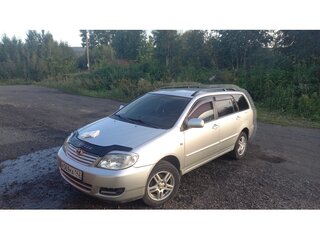 2004 Toyota Corolla IX (E120, E130), серебристый, 650000 рублей, вид 5