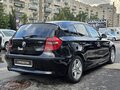 2009 BMW 1 серии 116i I (E81/E82/E87/E88) Рестайлинг, чёрный - вид 4