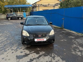 2011 Kia Rio II Рестайлинг, чёрный, 550000 рублей, вид 2