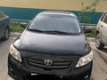 2007 Toyota Corolla AMT X (E140, E150), чёрный, 690000 рублей - вид 1