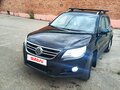 2011 Volkswagen Tiguan I, чёрный, 950000 рублей - вид 2