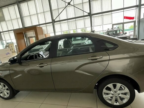 2026 Lada (ВАЗ) Vesta I Рестайлинг (NG), коричневый, 1862000 рублей - вид 4