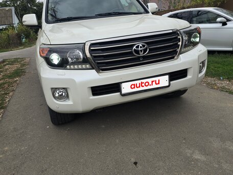 2014 Toyota Land Cruiser 200 Series Рестайлинг 1, белый, 4450000 рублей, вид 1