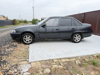 2011 Daewoo Nexia I Рестайлинг, чёрный, 130000 рублей, вид 3