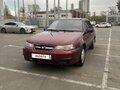 2012 Daewoo Nexia I Рестайлинг, пурпурный, 110000 рублей