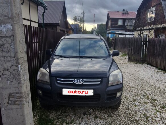 2007 Kia Sportage II, чёрный - вид 1