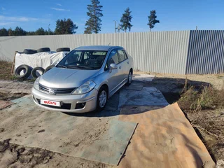 2010 Nissan Tiida I, серебристый, 600000 рублей, вид 3