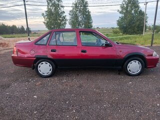 2012 Daewoo Nexia I Рестайлинг, пурпурный, 137000 рублей, вид 2