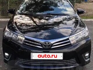 2013 Toyota Corolla XI (E160, E170, E180), чёрный, 1130000 рублей, вид 2