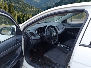 2007 Mitsubishi Lancer X, белый, 599000 рублей, вид 2
