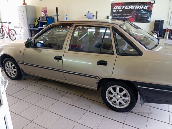 2005 Daewoo Nexia I, жёлтый - вид 2