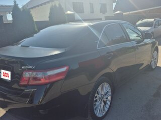 2009 Toyota Camry VI (XV40) Рестайлинг, чёрный, 980000 рублей, вид 3