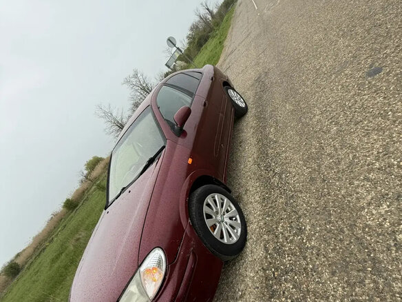 2001 Nissan Sunny N16, красный, 330000 рублей - вид 11