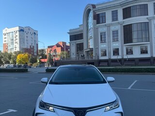 2021 Toyota Corolla XII (E210), белый, 1700000 рублей, вид 2