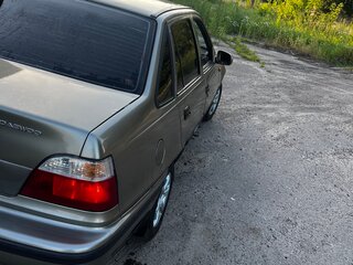 2004 Daewoo Nexia I, серебристый, 190000 рублей, вид 5